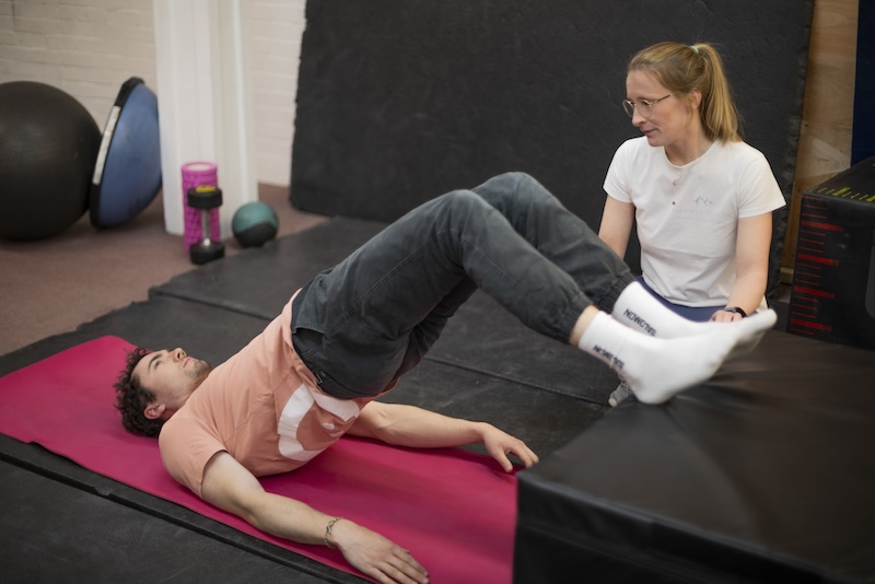 Physiotherapist working with a patient